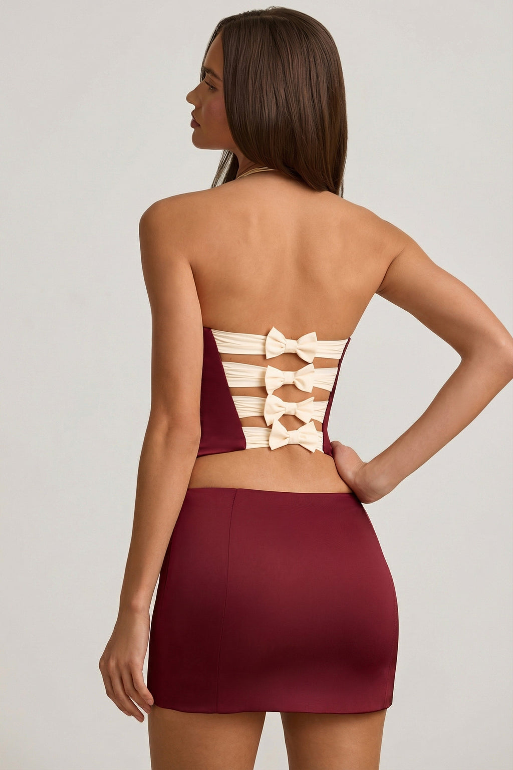 Satin Bow-Detail Low-Rise Mini Skirt in Wine Red
