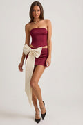 Satin Bow-Detail Low-Rise Mini Skirt in Wine Red